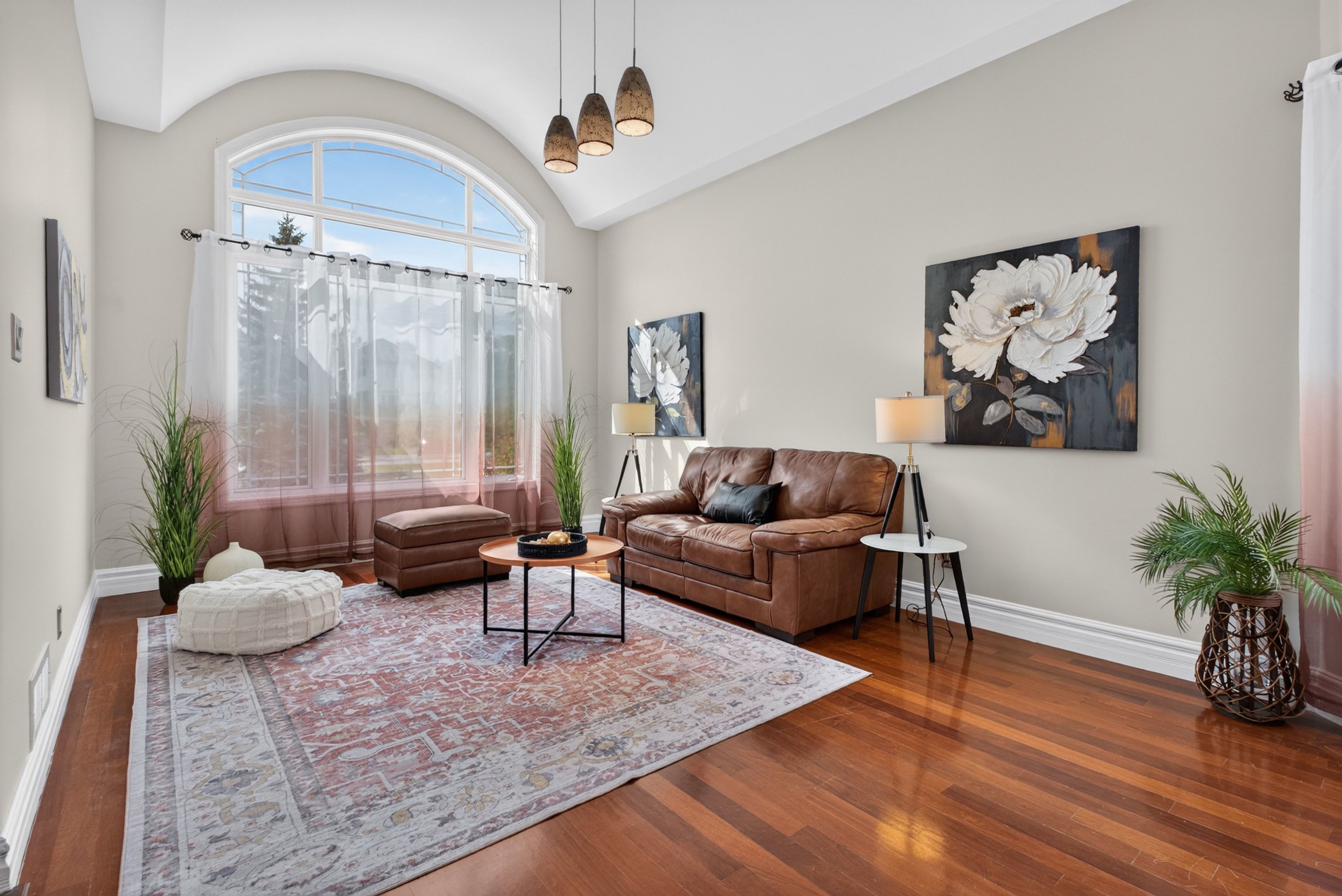 Formal living room with arched window