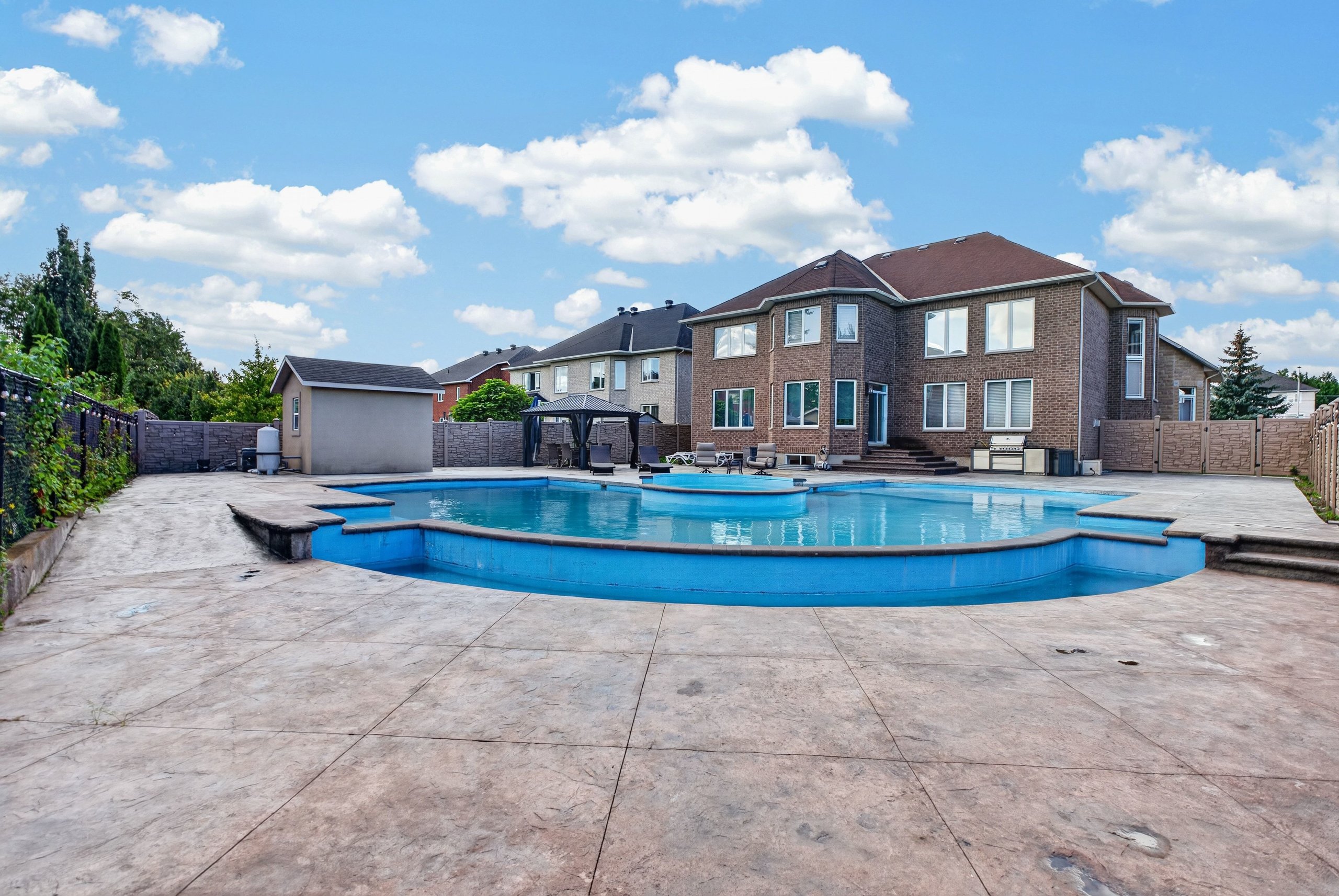 Pool with spillover spa